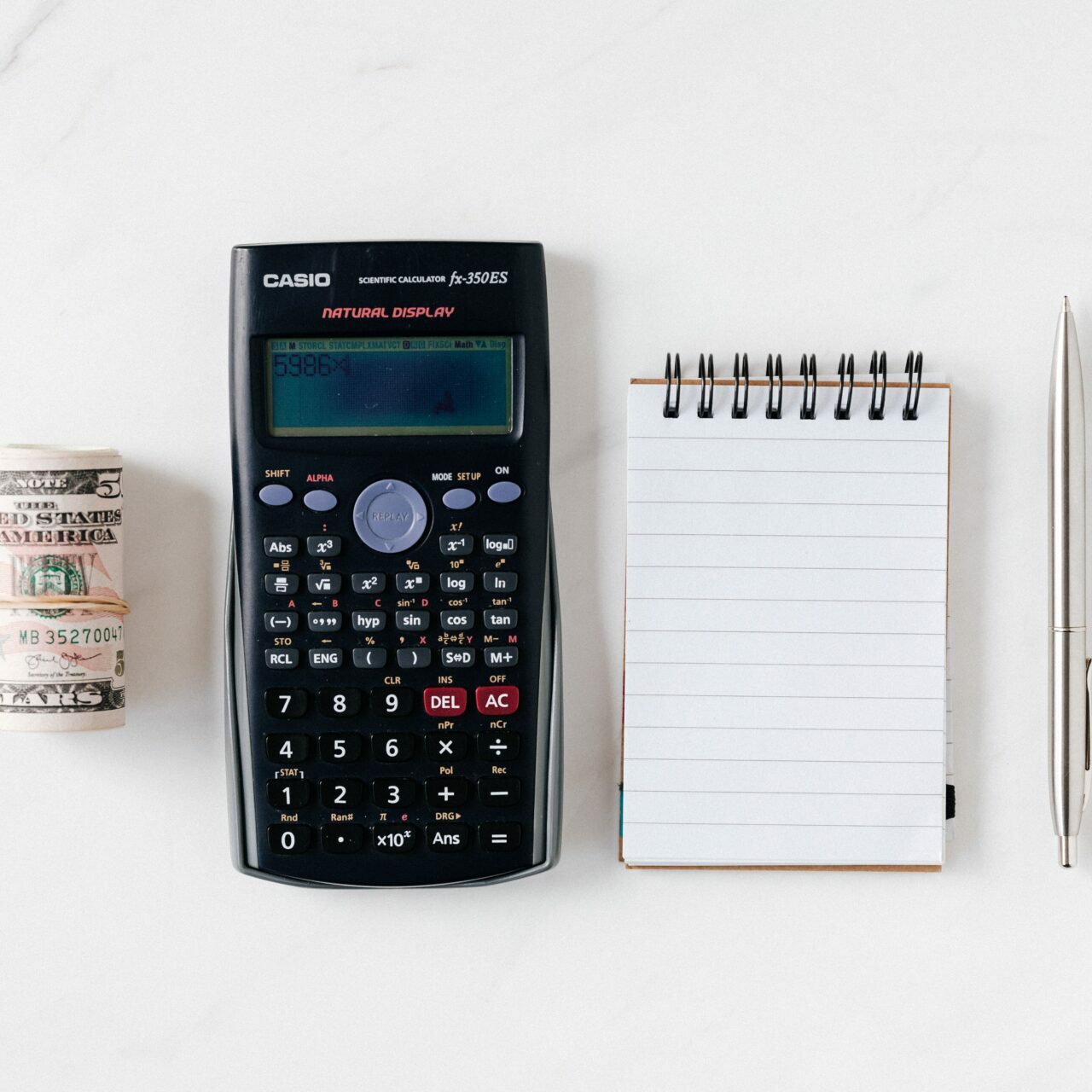 Budget-calculator-note-pen