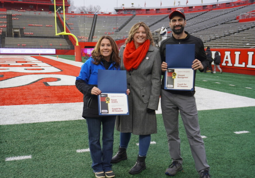 NJSIAA Partnership Spotlights "Coach for All Seasons" (l to r) Coach Susan Andris, NJEA Secretary-Treasurer Tina Dare and Coach Vincent Buccigrossi.