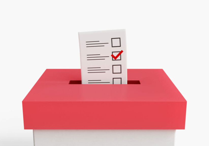 Casting a vote in ballot box