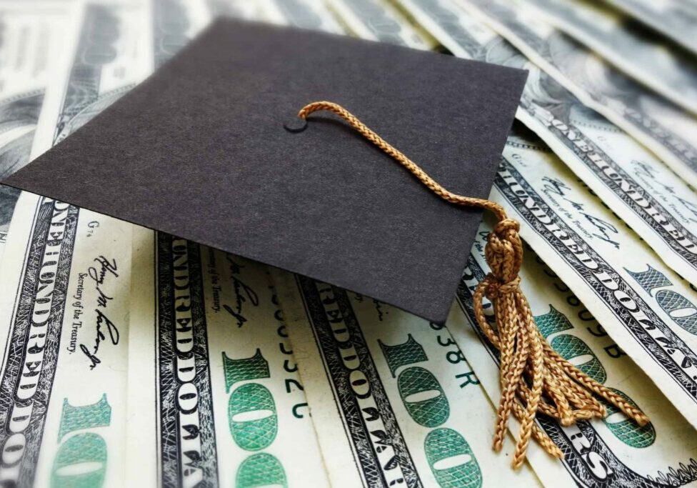 Graduation cap on money