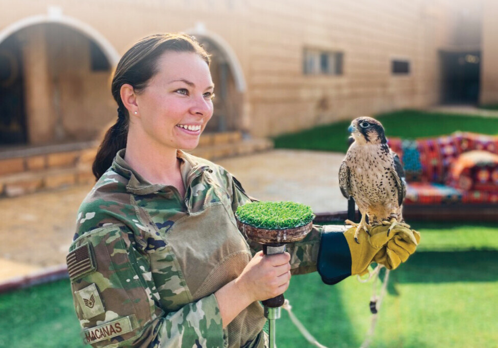 Alexis “Lexi” Macanis holds a falcon while deployed in Saudi Arabia. 